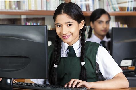 Indian High School Teenager Girl Student Using Computer Studying E