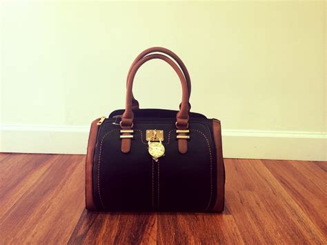 Fashion Black And Brown Handbag Perfect For Any Occasion