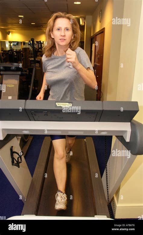 Lady Running On Treadmill At Champneys Springs Health Resort Near Ashby