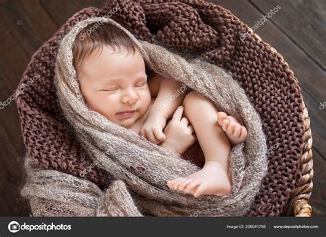 Newborn Baby Swaddled Tan Knit Blanket Basket Sleeping Newborn Baby