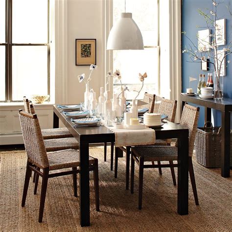 While it's pricier than other similar drop leaf options, the sturdy, sleek, and stylish look makes it worth the higher price tag. Ordered the Parsons expandable dining table from West Elm. Figured we would keep with the Parson ...