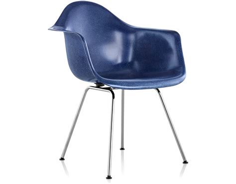 The armless version was harder to manufacture because the wider sides gave the piece stability. Eames® Molded Fiberglass Armchair With 4 Leg Base - hivemodern.com