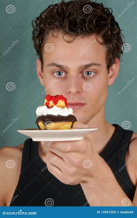 Young Man With Cupcake Stock Image Image Of Handsome 13997205