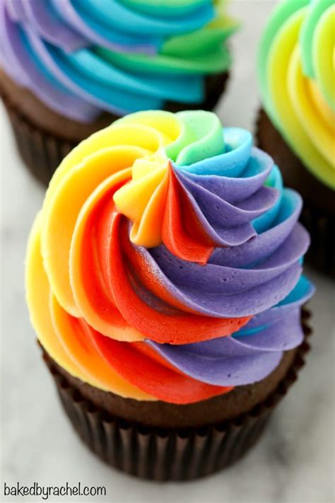 This post may contain affiliate links and we may be the first things you'll need, of course, are cupcakes and icing! Moist homemade chocolate cupcakes with fluffy rainbow ...