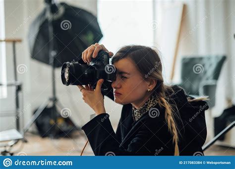 Close Up Portrait Of A Female Photographer Doing A Photo Shoot In A