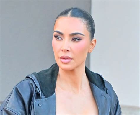 Kim Kardashian Masters Monochrome In Trench Coat And Pants Boots