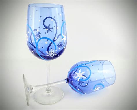 2 Winter Snowflake Wine Glasses Hand Painted With Snow Flakes On Blue Wine Glass Winter Theme