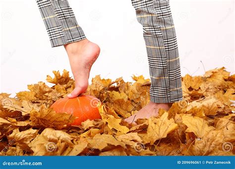 Bare Foot Of Teenage Girl Stepping On Pumpkin Stock Image Image Of