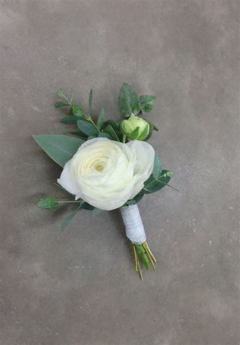 White Ranunculus Boutonnière With Eucalyptus By Nancy At Belton Hyvee
