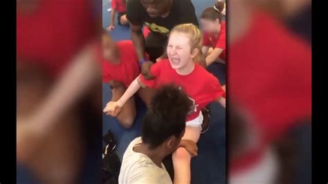 CONTROVERSIAL Cheerleader Forced Into Splits YouTube