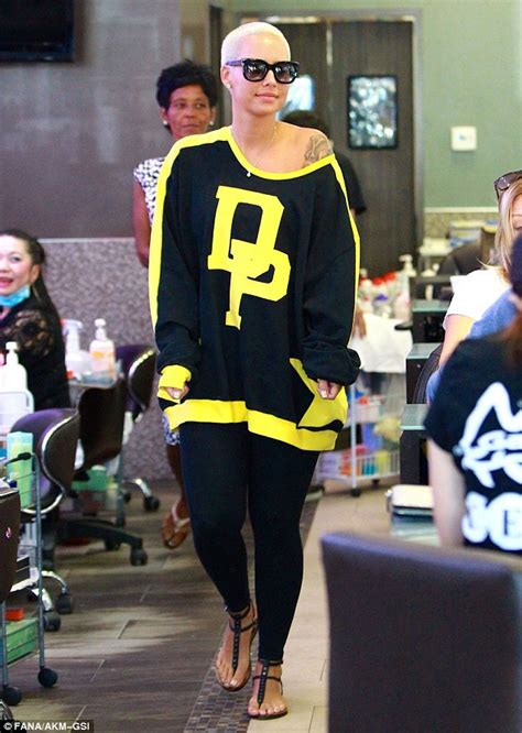 Amber Rose Downplays Her Sex Appeal In Sporty Jersey For Mother