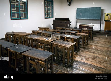 Historic Old Style Classroom With Wooden Desks At Meiji Period 1868