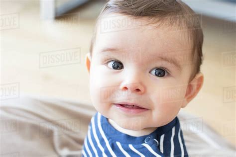Baby smiling, portrait - Stock Photo - Dissolve
