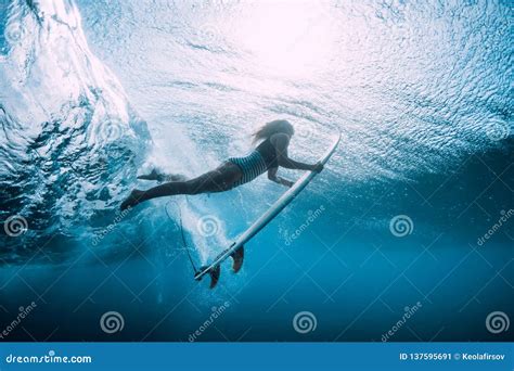 Surfer Woman Dive Underwater With Under Blue Wave Stock Image Image