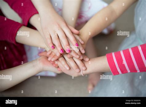 Girls Putting Hands Together Close Up Stock Photo Alamy