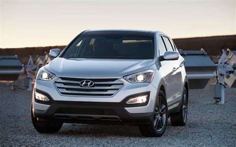 The santa fe sport isn't roomier than the escape only through its interior design. 2013 Hyundai Santa Fe Review, Specs, Photo | Latest Car Review