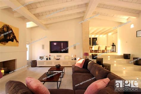 Living room with brown sectional sofa, Stock Photo, Picture And Rights