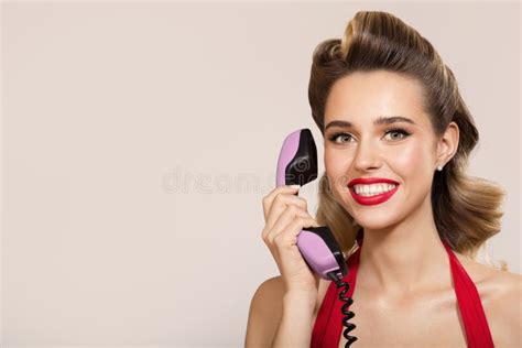 Joyful Pin Up Girl Talking On A Retro Phone Stock Image Image Of