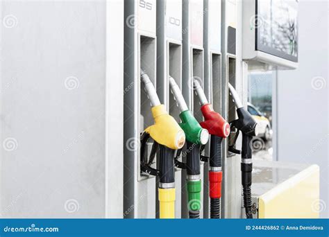 Pistols At Gas Stations With Different Types Of Gasoline Close Up
