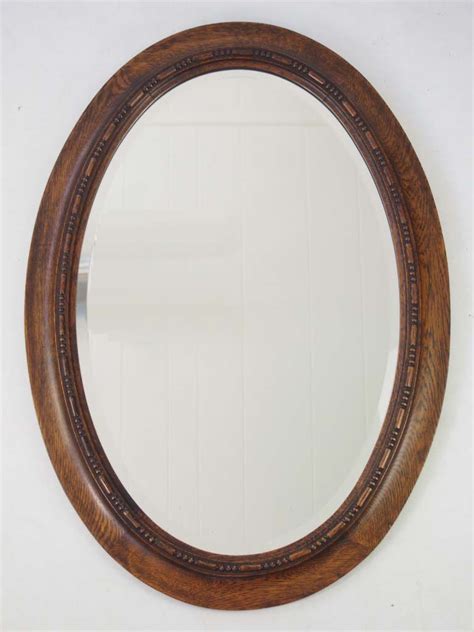 Edwardian Oak Framed Oval Mirror