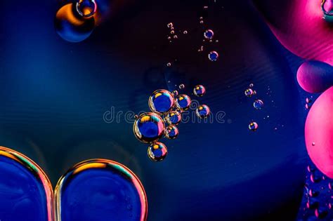 Abstract Colorful Background With Oil On Water Surface Oil Drops In