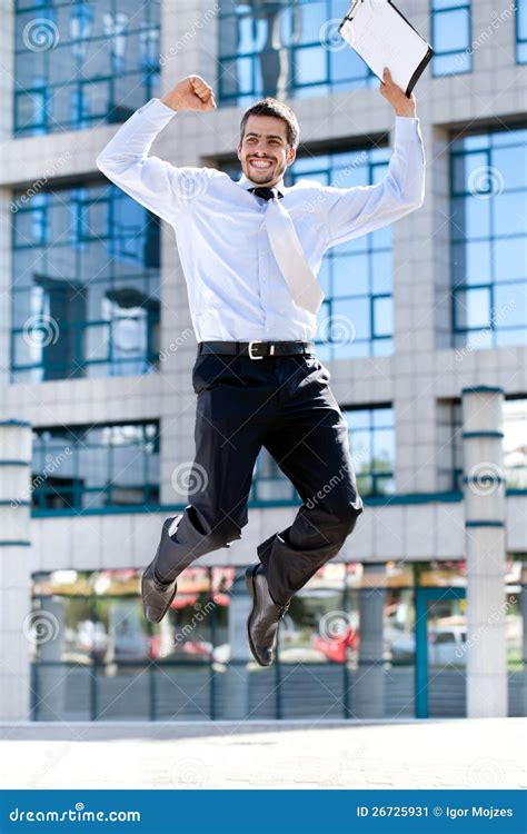 Happy Businessman Jumps In The Air Stock Image Image Of