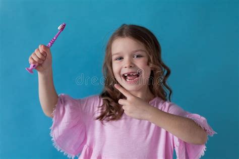 Small Beautiful Girl Cleans Teeth Toothbrush Dentistry Stock Photo