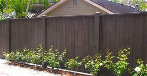 Over the course of that year, the wood pores should open up a little bit when the stain starts to fade, wash it down with wood cleaner. dark stain cedar fence inspiration | Backyard fences ...