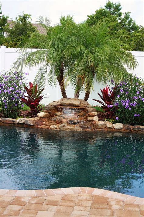 Pin By Sunny Niles On Home Backyard Pool Landscaping Tropical Pool Landscaping Pool Landscaping