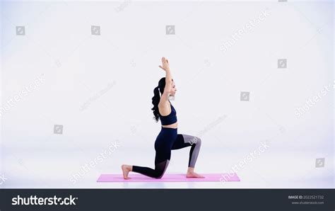 Side View Barefoot Woman Exercising On Stock Photo 2022521732