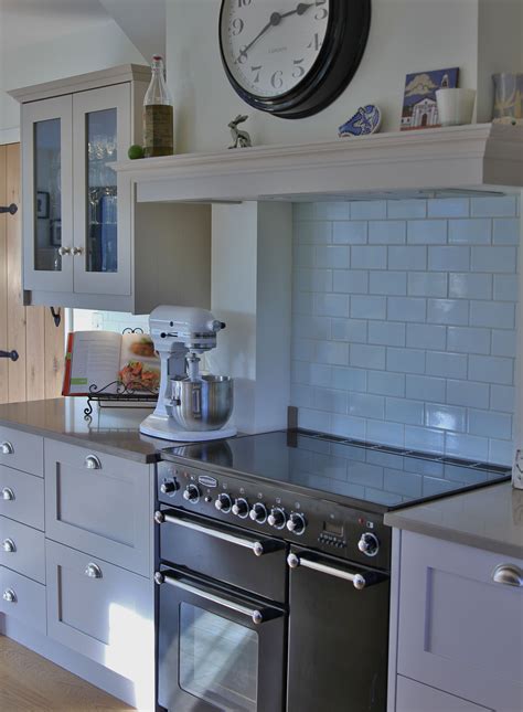 Shaker Kitchen With Glazed Wall Units Faux Canopy Above Range Cooker