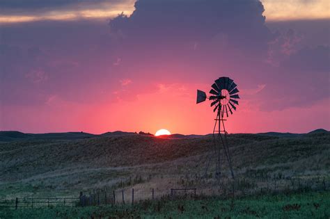 Windmill Surrounded With Green Grass Nebraska Hd Wallpaper Wallpaper