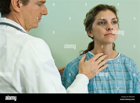 Doctor Examining Patients Neck Glands Stock Photo Alamy