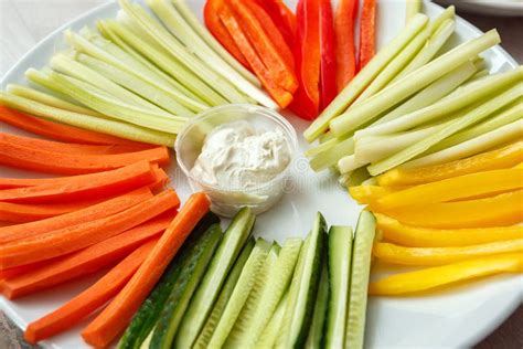Sliced Cucumbers Carrots Celery Peppers On A Plate Stock Photo