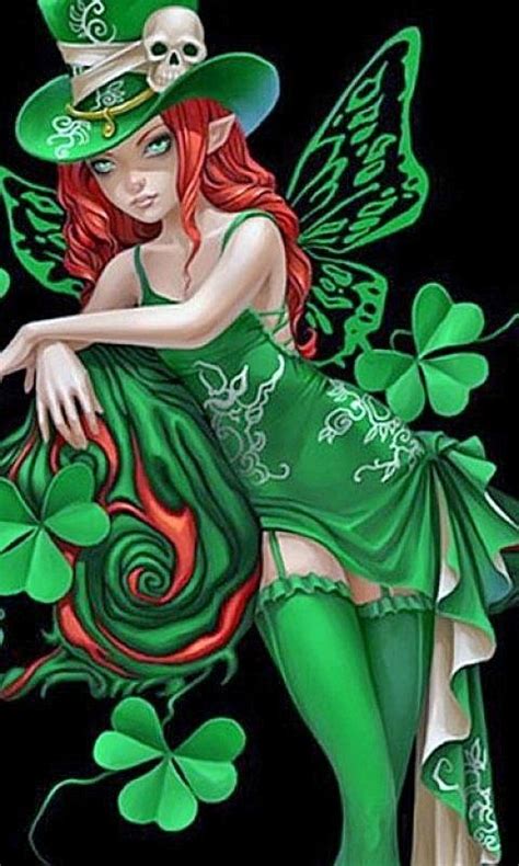 A Woman Dressed In Green Sitting On Top Of Clovers