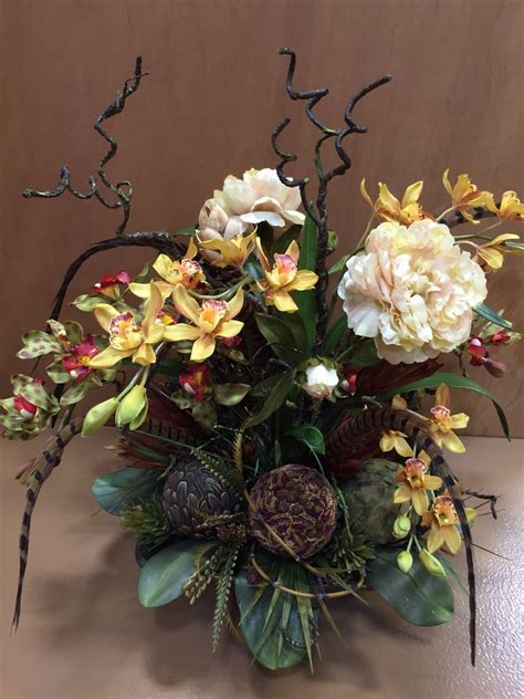 Exotic tropical silk floral arrangement. Designed by Arcadia Floral & Home Decor | Flower decorations