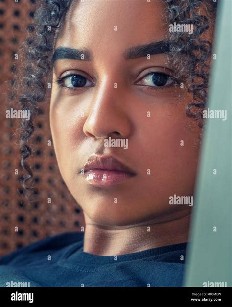 Indoor Portrait Of Beautiful Happy Mixed Race African American Girl