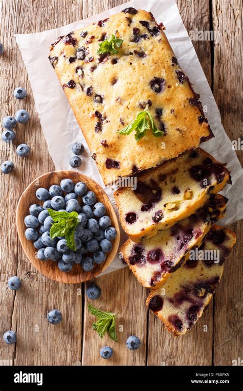 Dessert Sliced Fresh Blueberry Bread Muffin Cake With Mint Closeup On