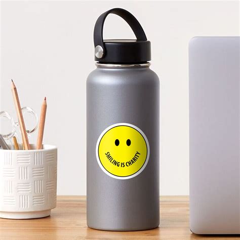 Smiling Is Charity Yellow Smiley Face Sticker By Niqaabibi Redbubble