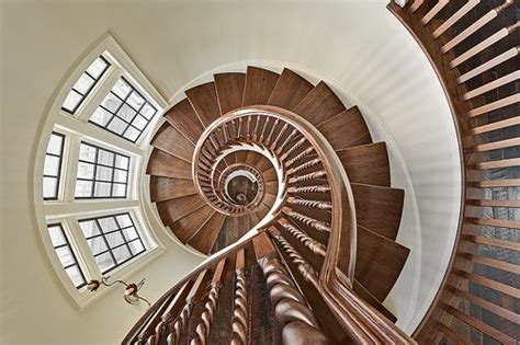 A Spiral Staircase Is Shown In This Image