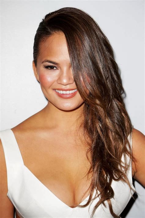 Chrissy Teigen Showing Huge Cleavage At The Beach Bunny Fashion Show In