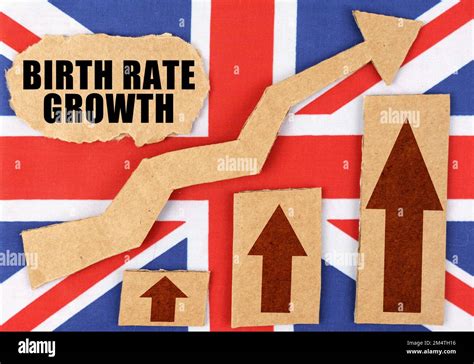 the concept of national statistics on the flag of great britain a growth chart and a cardboard