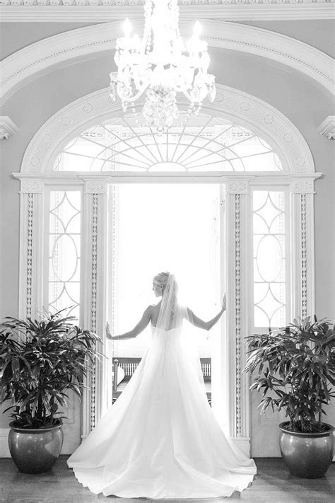 Bride Backlit In Doorway Dana Cubbage Weddings Charleston Sc