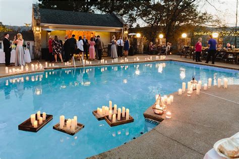 Poolside Cocktail Hour With Floating Candles At Gallaher Bend Wedding Venue In Knoxville Tn