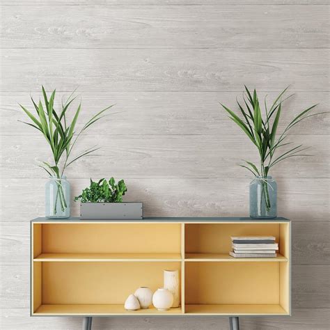 The home depot offers grass cloth wallpaper if you're looking for a more organic feel and want to bring nature indoors. NuWallpaper 30.75 sq. ft. Grey Wood Plank Peel and Stick ...