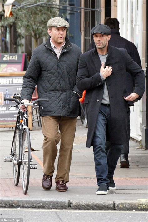 Guy Ritchie And Jason Statham Wear Matching Caps For Lads Day Out