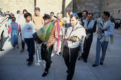 Israel Jerusalem Sephardic Rabbi With Boy Carrying The Torah At His Bar