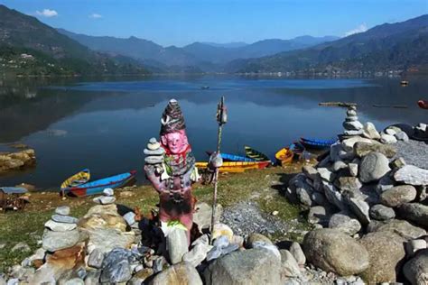 rock carvings at phewa lake in pokhara nepal hole in the donut travel