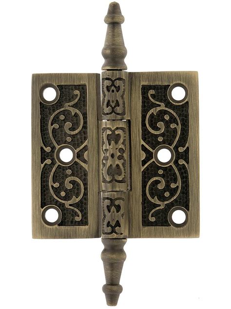 2 12 Inch Solid Brass Steeple Tip Hinge With Decorative Vine Pattern