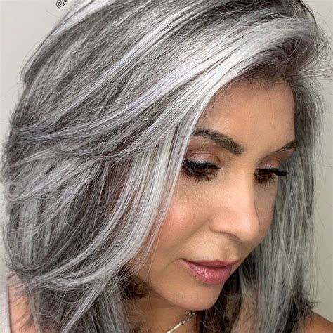 A Colorist Explains How To Get The Silver Hair Of Your Dreams Gray Hair Highlights Hair Color